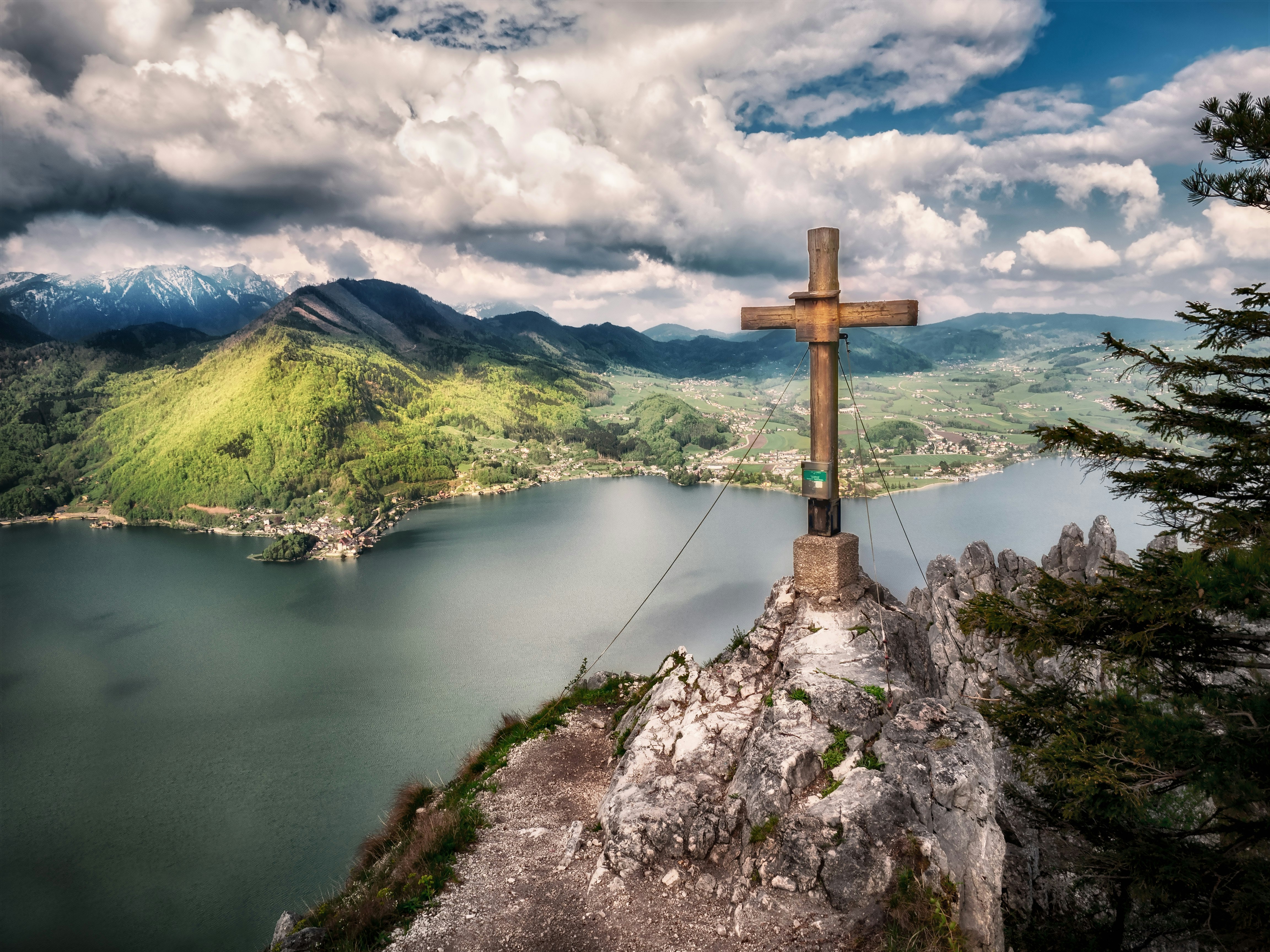 brown wooden cross on top of mountain